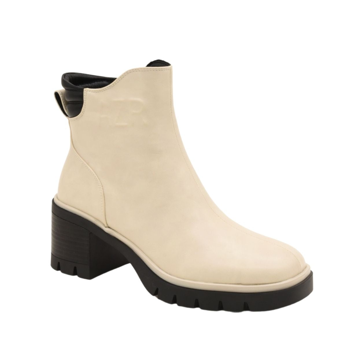 Beige ankle boots with a block heel and black detail.