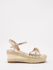 Gold wedge sandals with woven platform