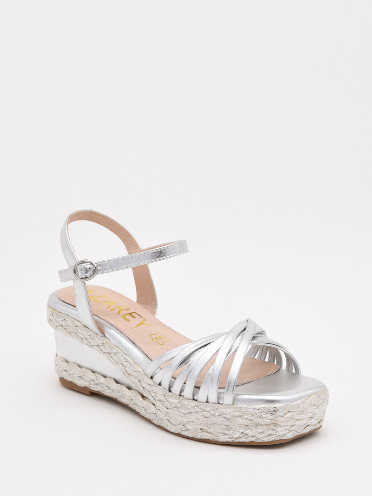 Silver wedge sandals with a woven platform and elegant straps