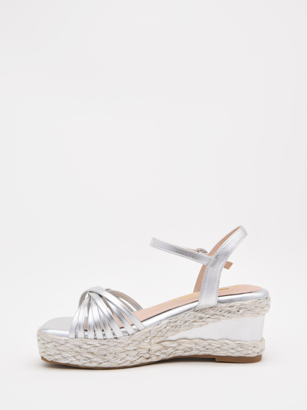 Silver wedge sandals with a woven platform and elegant straps