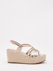 Metallic gold espadrille wedges with crossover straps