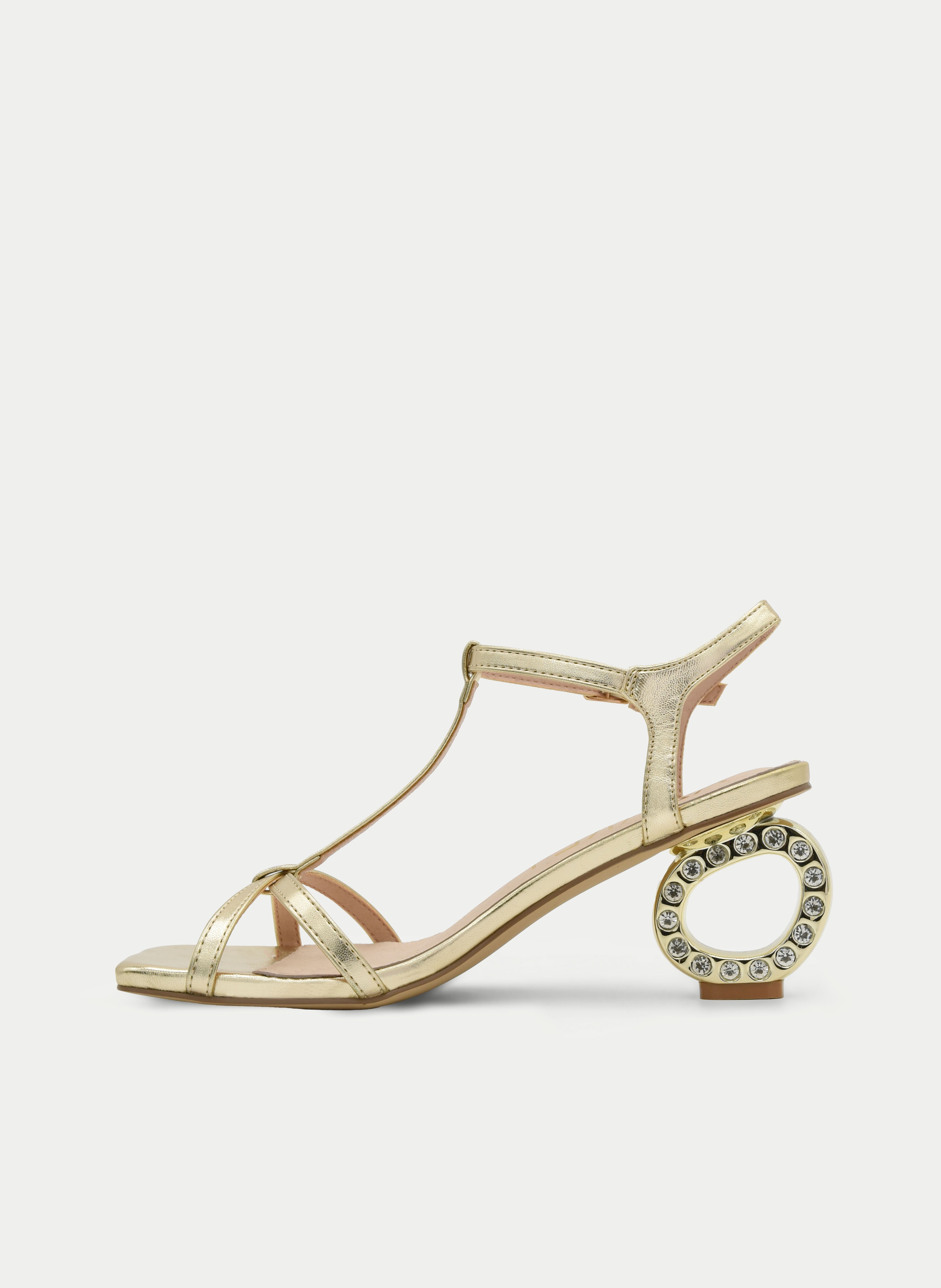 Low-heeled gold sandals with crystal detail