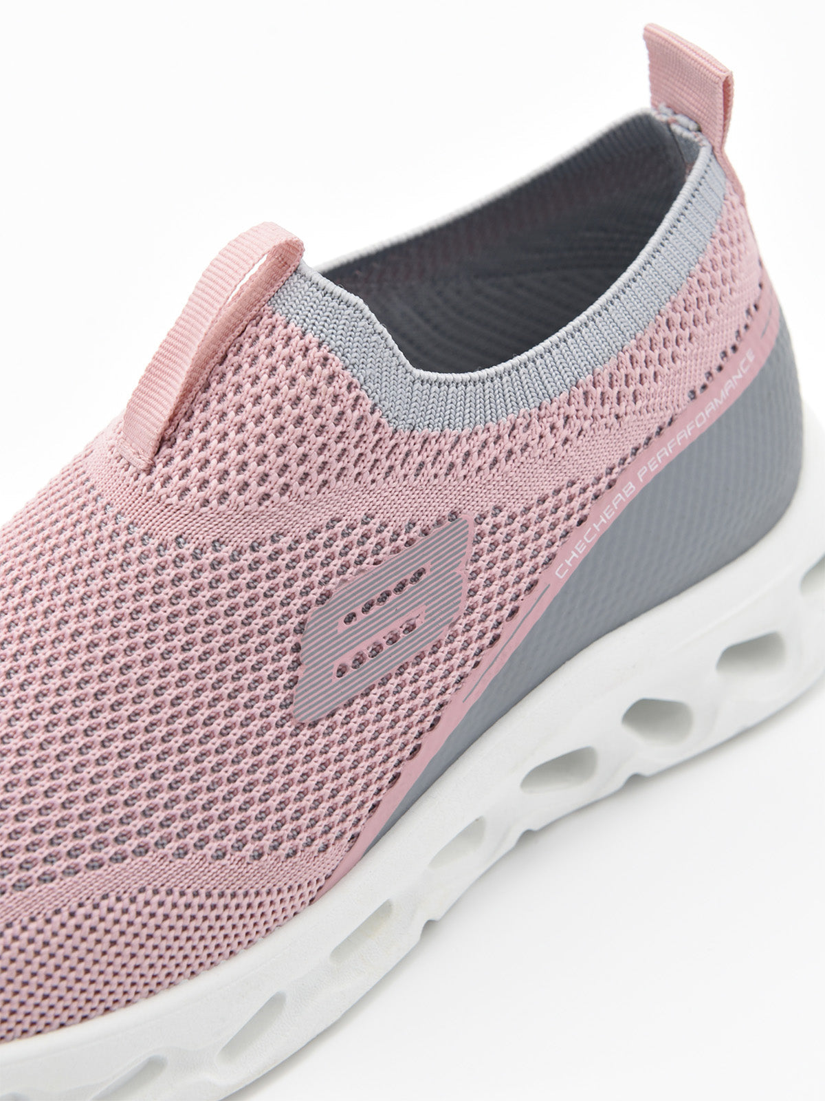 Pink slip-on sneaker with white ergonomic sole