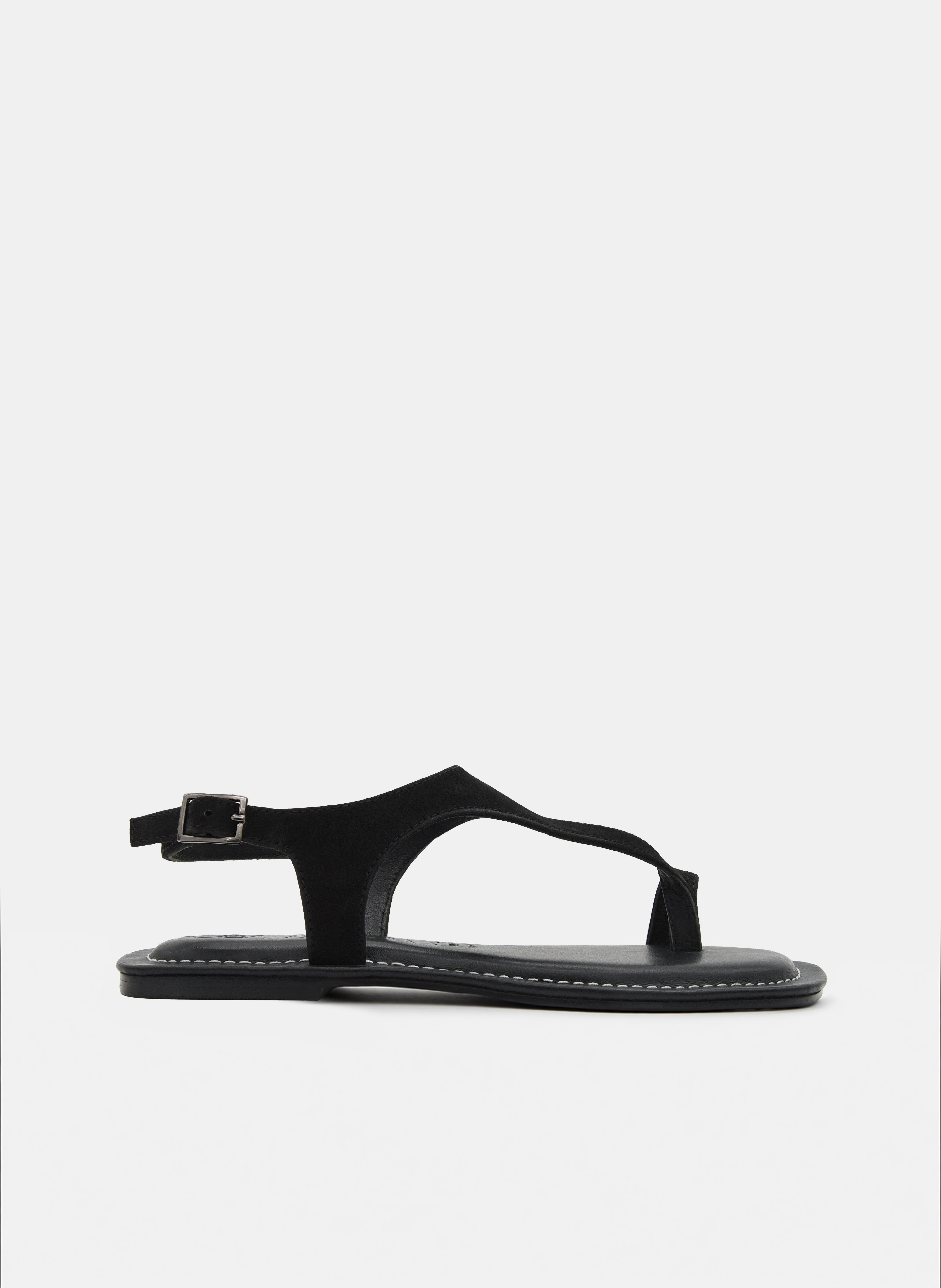 SANDALIAS DE PIEL PLANAS NEGRAS DE DEDO CON HEBILLA
