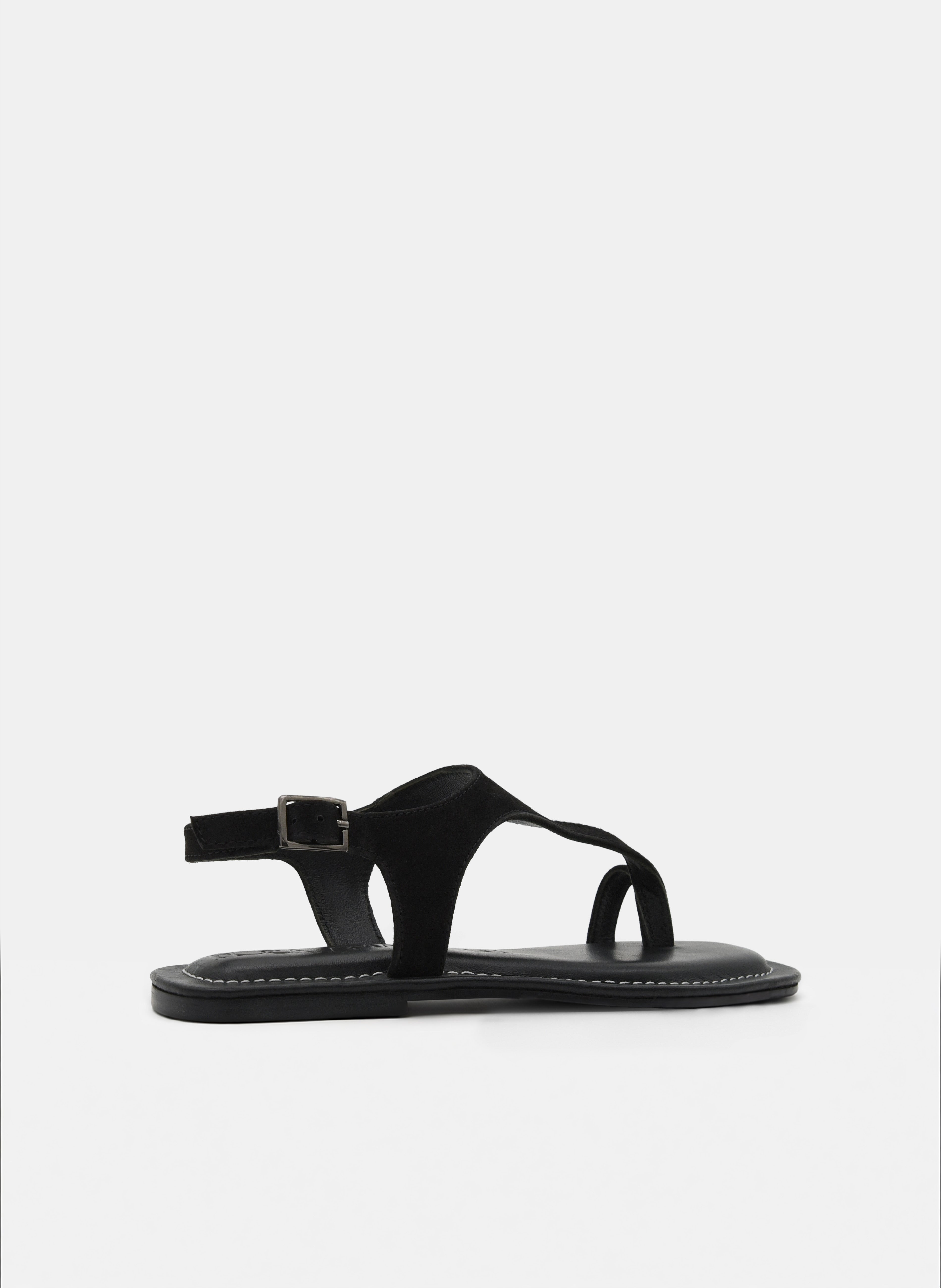 SANDALIAS DE PIEL PLANAS NEGRAS DE DEDO CON HEBILLA