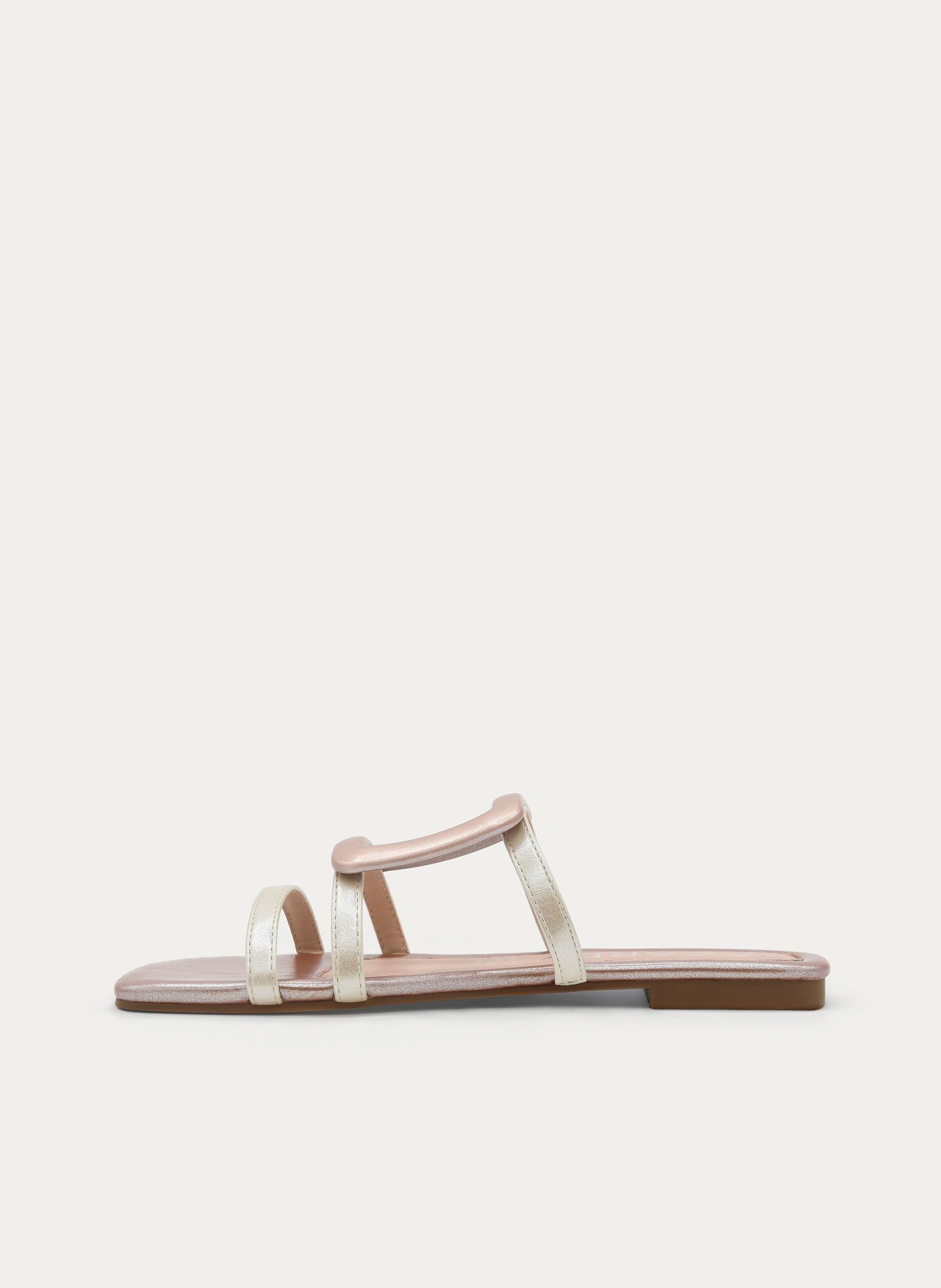SANDALIA PLANA ORO ROSA CON HEBILLA DECORATIVA