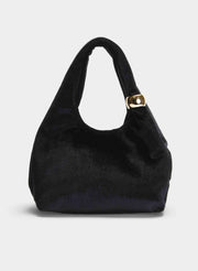 BOLSO NEGRO DE TERCIOPELO CON ASA ANUDADA Y DETALLE DORADO